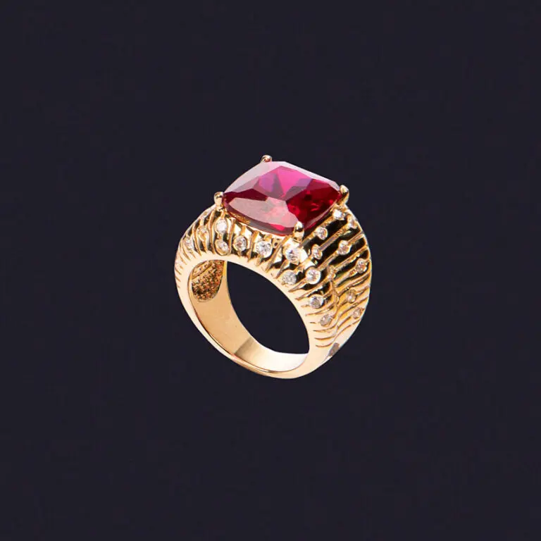 Anello fascia con pietra centrale color rubino 1